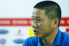 Hình ảnh khiêm tốn của ông Nghiêm trái ngược với phong độ tưng bừng mà học trò ông đang thể hiện. (Ảnh: Minh Chiến/Vietnam+)