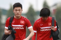 Tuấn Anh, Xuân Trường (trái) trong ngày đầu tiên lên tuyển sáng nay (15/3). (Ảnh: Đỗ Đen/Vietnam+)