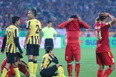 Thảm bại 2-4 trước Malaysia ở Mỹ Đình tại bán kết AFF Cup 2014 trước 40.000 khán giả nhà là một trong những trận thua tồi tệ nhất lịch sử thể thao Việt Nam. (Ảnh: Minh Chiến/Vietnam+)