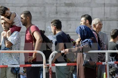 Người di cư tại nhà ga ở Munich, miền nam nước Đức. (Nguồn: AFP/TTXVN)