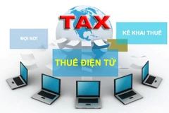 Cơ quan thuế cảnh báo có một số đối tượng giả danh cán bộ thuế cung cấp đường dẫn và hướng dẫn người nộp thuế cài đặt các phần mềm giả mạo. (Ảnh: CVT/Vietnam+)