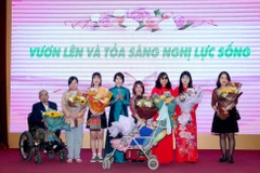 Chương trình 'Vươn lên và tỏa sáng nghị lực sống' với 170 thành viên tham gia, là phụ nữ và trẻ em gái thuộc 8 nhóm khuyết tật đang được Bộ Kế hoạch và Đầu tư bảo trợ. (Ảnh: Vietnam+)