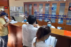 21/36 khoản phí, lệ phí được giảm tới 50%. (Ảnh: PV/Vietnam+)
