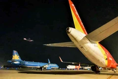 Sân bay Tân Sơn Nhất sẽ được tăng cường khai thác chuyến bay đêm trong dịp Tết Nguyên đán. (Ảnh: CTV/Vietnam+)