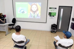 Trước khi trở thành đối tác GoCar chính thức các ứng viên vẫn phải trải qua một lớp học và phải vượt qua bài kiểm tra cuối khoá thực hiện online. (Ảnh: CTV/Vietnam+)
