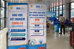 Cảng hàng không quốc tế Nội Bài sẽ tạm dừng dịch vụ test nhanh COVID-19 cho hành khách từ 16/12. (Ảnh: CTV/Vietnam+)