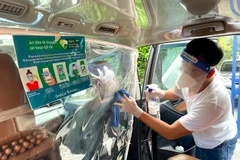 Dịch vụ GrabCar đáp ứng toàn bộ các tiêu chí an toàn đối với hoạt động giao thông vận tải trong công tác phòng, chống dịch. (Ảnh: CTV/Vietnam+)