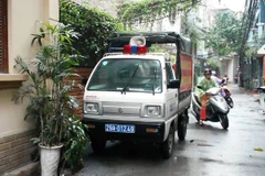 Cơ quan công an có mặt tại hiện trường. (Ảnh: PV/Vietnam+)