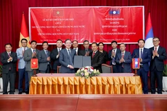 Lễ Ký kết Biên bản Ghi nhớ Hợp tác giữa Trung ương Hội Nông dân Việt Nam và Trung ương Mặt trận Lào Xây dựng Đất nước. (Ảnh: Đỗ Bá Thành/TTXVN)