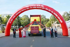 Lễ xuất container macca Đắk Lắk đầu tiên vào thị trường Hàn Quốc. (Ảnh: Hoài Thu/TTXVN)