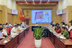 Bí thư Thành ủy Hà Nội Đinh Tiến Dũng làm việc với Quận Ba Đình về cải tạo chung cư cũ, ngày 16/4/2024. (Ảnh: Nguyễn Văn Cảnh/TTXVN)