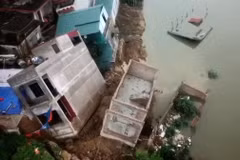 Hiện trường vụ sạt lở đê hữu Cầu thuộc địa phận phường Vạn An, thành phố Bắc Ninh. (Ảnh: TTXVN phát)