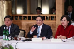 Thủ tướng Phạm Minh Chính phát biểu tại cuộc Tọa đàm. (Ảnh: Dương Giang/TTXVN)