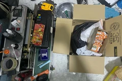 Tang vật vụ án được Công an thu giữ. (Nguồn: Báo Pháp luật Thành phố Hồ Chí Minh)