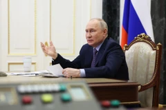 Tổng thống Nga Vladimir Putin chủ trì một cuộc họp tại Moskva. (Ảnh: AFP/TTXVN)