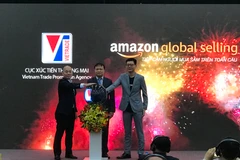 Khởi động chương trình hợp tác giữa Cục Xúc tiến thương mại và Amazon Global Selling. (Ảnh: Đức Duy/Vietnam+)
