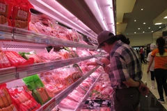 Dự báo mỗi tháng cận Tết sẽ thiếu từ 25.000-30.000 tấn thịt hơi. (Ảnh: Đức Duy/Vietnam+)