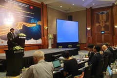 Các đại biểu tham dự Hội thảo sản xuất tốt hơn với kỹ thuật số trong ngành dệt may. (Ảnh: Xuân Quảng/Vietnam+)