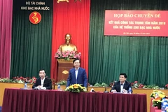 Ông Nguyễn Quang Vinh, Phó Tổng Giám đốc Kho bạc Nhà nước phát biểu tại họp báo. (Ảnh: Đức Duy/Vietnam+)
