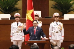 Thủ tướng Phạm Minh Chính tuyên thệ trước Quốc hội, đồng bào và cử tri cả nước. (Ảnh: Trọng Đức/TTXVN)
