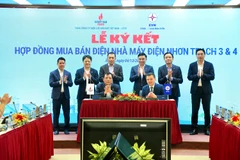 Ký kết PPA dự án Nhà máy điện Nhơn Trạch 3&4 giữa PV Power và EVNEPTC. (Ảnh: PV/Vietnam+)