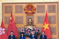 Lễ trao đổi Bản ghi nhớ hợp tác trong xúc tiến thương mại giữa Cục Xúc tiến thương mại (Bộ Công Thương Việt Nam) và Hội đồng Phát triển Thương mại Hpngkong (Trung Quốc). (Ảnh: PV/Vietnam+)