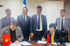 Quang cảnh lễ ký kết hợp tác giữa Trường Đại học Công nghệ và Quản lý Hữu nghị (UTM) của Việt Nam và Trường Đại học Andrés Bello (UCAB) của Venezuela. (Ảnh: TTXVN phát)