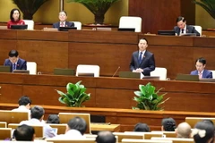 Bộ trưởng Bộ Tài nguyên và Môi trường Đỗ Đức Duy giải trình, làm rõ một số vấn đề đại biểu Quốc hội nêu. (Ảnh: Minh Đức/TTXVN)