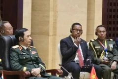 Đại tướng Phan Văn Giang, Ủy viên Bộ Chính trị, Phó Bí thư Quân ủy Trung ương, Bộ trưởng Bộ Quốc phòng Việt Nam, tham gia cuộc gặp. (Ảnh: TTXVN phát)