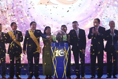 Nghi thức đánh dấu kỷ niệm 10 năm thành lập BIDC. (Ảnh: Trần Long-Minh Hưng/TTXVN)