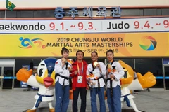 Taekwondo Việt Nam giành huy chương vàng đầu tiên. (Ảnh: Hữu Tuyên/Vietnam+)