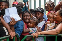 Người di cư trong hành trình tới Mỹ tại khu vực Tapachula, bang Chiapas, Mexico, gần biên giới với Guatemala. (Ảnh: AFP/TTXVN)