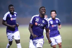 Omar giúp Hà Nội FC đánh bại Bình Dương để vô địch Đông Nam Á. (Ảnh: Trọng Đạt/TTXVN)