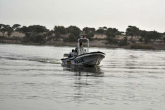 Lực lượng cứu hộ tìm kiếm người mất tích. (Nguồn: AFP)