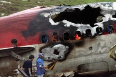 Hiện trường vụ tai nạn máy bay. (Nguồn: AFP)