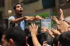 Người biểu tình ủng hộ cựu tổng thống Morsi trong cuộc tuần hành ở trung tâm Cairo, ngày 19/6. (Nguồn: Reuters)
