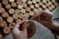 Sản xuất hàng mây tre đan xuất khẩu tại Công ty Mây tre đan xuất khẩu Ngọc Khánh, xã Phú Vinh, huyện Chương Mỹ, Hà Nội. (Ảnh: Trọng Đạt/TTXVN)