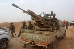 Các lực lượng Iraq trong chiến dịch chống IS tại tỉnh Anbar ngày 15/9. (Nguồn: AFP/TTXVN)