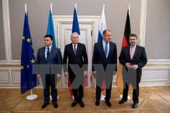 Ngoại trưởng các nước thuộc Nhóm Bộ tứ Normandy sau cuộc đàm phán ở Munich ngày 18/2. (Nguồn: AFP/TTXVN)
