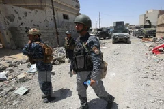Lực lượng Iraq tuần tra tại Mosul. (Ảnh: AFP/TTXVN)
