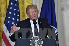 Tổng thống Mỹ Donald Trump trong cuộc họp báo ở Washington, DC ngày 12/4. (Nguồn: AFP/TTXVN)