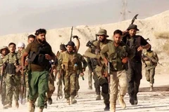 Các tay súng thuộc phe nổi dậy Syria ở Aleppo. (Nguồn: Reuters)