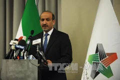 hủ tịch SNC Ahmed al-Jarba trong cuộc họp báo tại Istanbul, Thổ Nhĩ Kỳ ngày 7/10. THX/ TTXVN