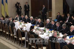 Quang cảnh cuộc đàm phán hôm 13/12 (Nguồn: TTXVN)