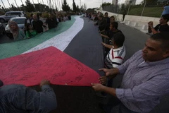 Palestine: Quốc kỳ 25.000 chữ ký biểu trưng tinh thần dân tộc
