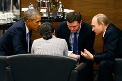 Tổng thống Nga Vladimir Putin (phải) và người đồng cấp Mỹ Barack Obama tại cuộc hội đàm. (Nguồn: EPA)