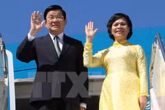 Chủ tịch nước Trương Tấn Sang và Phu nhân. (Ảnh: Nguyễn Khang/TTXVN)