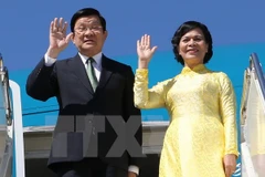 Chủ tịch nước Trương Tấn Sang và Phu nhân. (Ảnh: Nguyễn Khang/TTXVN)