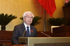 Chủ nhiệm Ủy ban Văn hóa, Giáo dục, Thanh niên, Thiếu niên và Nhi đồng của Quốc hội Phan Thanh Bình trình bày Báo cáo giải trình, tiếp thu, chỉnh lý dự án Luật Du lịch (sửa đổi). (Ảnh: Phương Hoa/TTXVN)