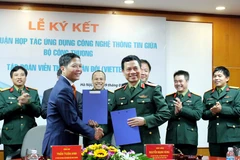 Lãnh đạo Bộ Công Thương và Viettel ký kết thỏa thuận. (Nguồn: BCT)